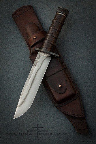 Survival knife with hollow handle, guard, and pocket sheath by knifemaker Tomas TRMAN Rucker.