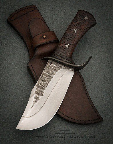 Compact full-tang Bowie knife with hamon line and dark wood handle by Tomas TRMAN Rucker.