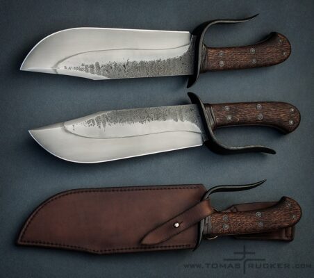 Large fulltang Bowie knife Large full-tang Bowie knife with hamon line and dark wood handle by Tomas TRMAN Rucker.