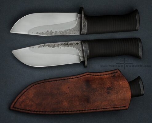 Leather handle knife Bushcraft knife with hamon line and stacked leather washer handle by Tomas TRMAN Rucker.